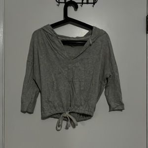 Grey crop with hood and adjustable waist band.